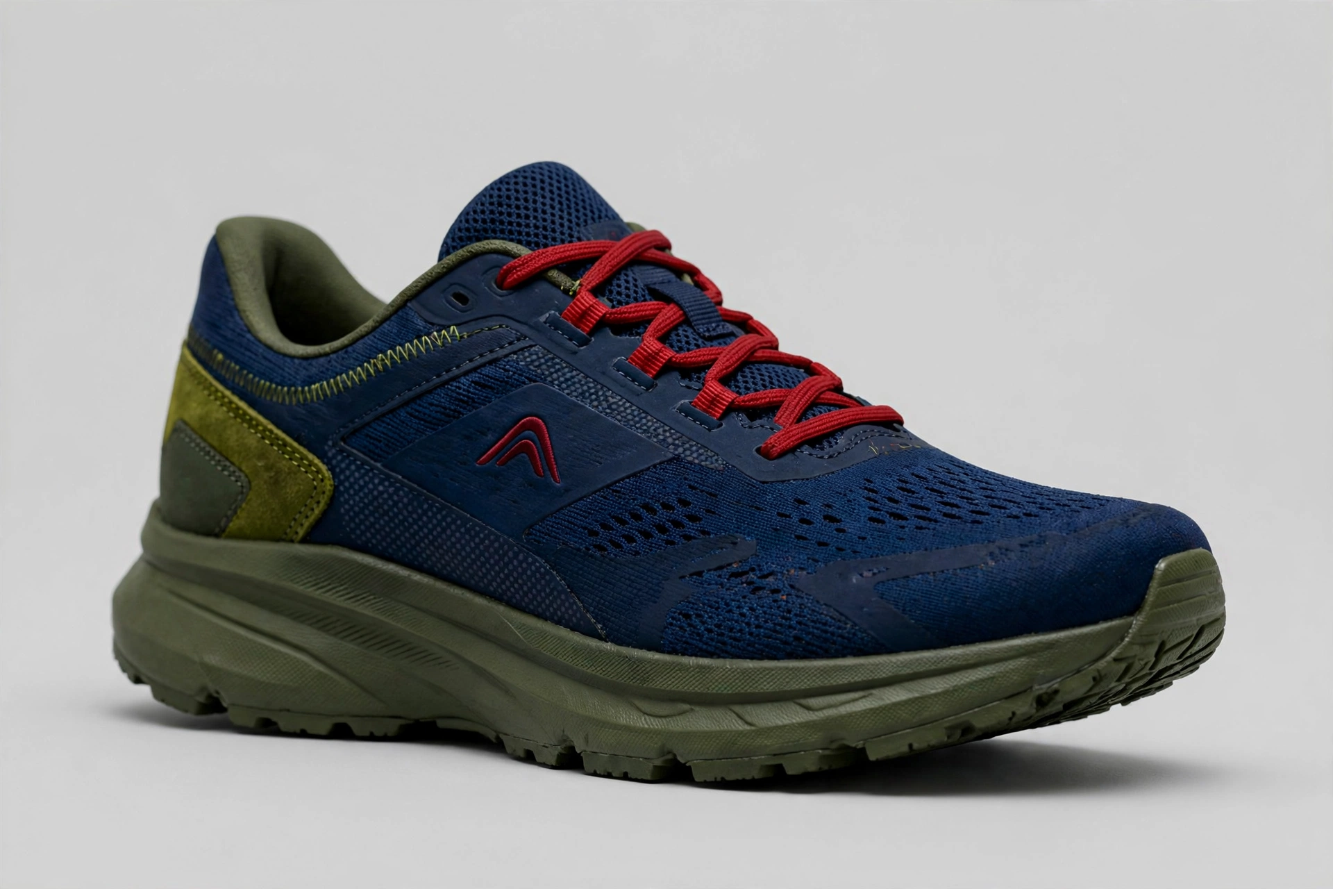 A sneaker colorway in layered navy shades with an olive sole and heel and red only in the logo and laces